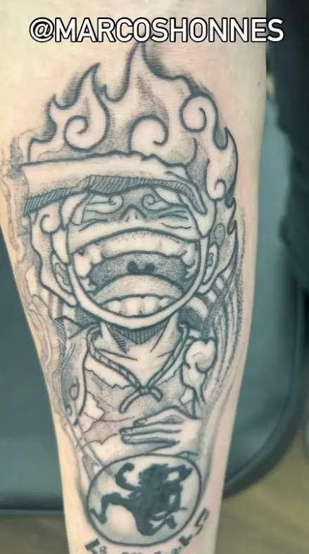 Black linework tattoo of a flaming crowned character