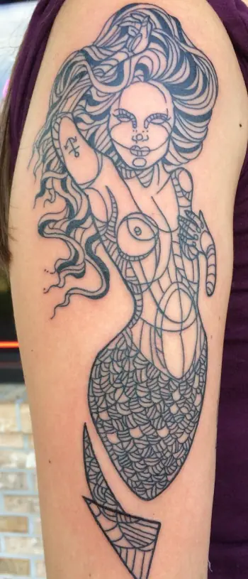 Fine-line mermaid tattoo